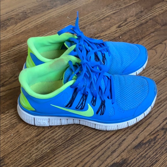 blue and green nike shoes